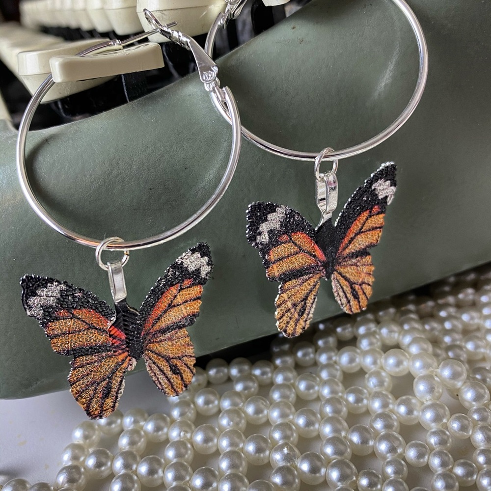 Butterfly silver hoop earrings